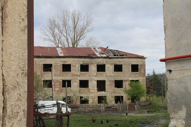 Chiatura. Soviet Past in the present. + Katskhi pillar - Katskhi Pillar and its impossible setting