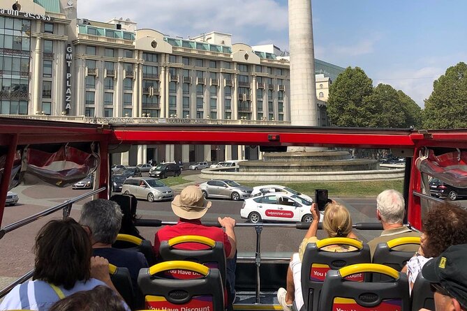 City tour Tbilisi on red bus - Audio commentary and the guide experience