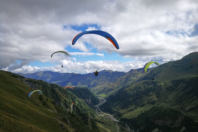 Cloudbase Paragliding in Gudauri, Georgia - Taking off above Gudauri