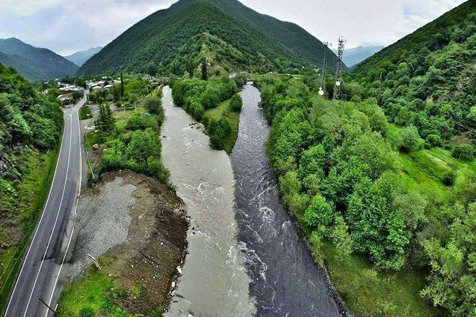 Day tour to mountains Jinvali lake, Ananuri, Kazbegi, Arch friendship - The Friendship Monument and the road beyond Gudauri