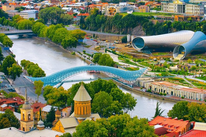Discover Tbilisi: Hidden Gems and Iconic Sights Walking Tour - The Bridge of Peace and the river crossing