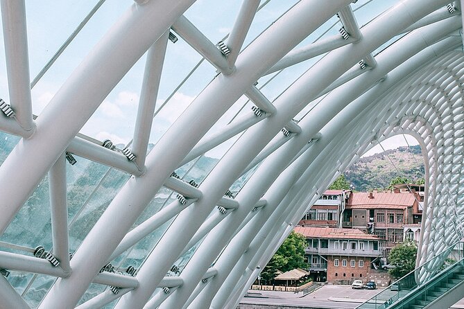 Explore Tbilisi Full Day Tour ( 3KM stroll rest by the car) - The Bridge of Peace and the Mtkvari River
