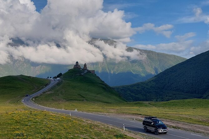 From Tbilisi: Kazbegi Ananuri Gudauri and Trusso Valley by 4x4 - Gergeti Trinity Church and weather limits