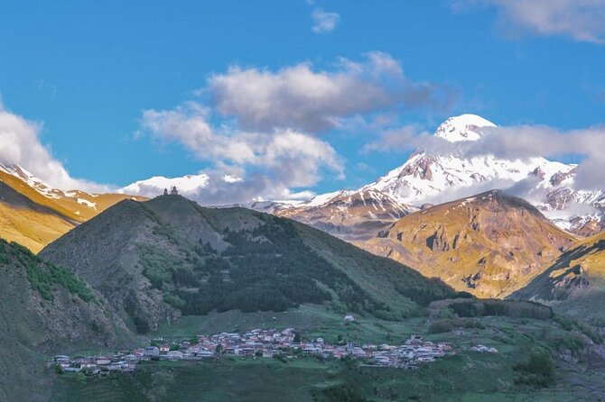 From Tbilisi: Kazbegi Day Tour, Gergeti Trinity, Ananuri &Gudauri - Gergeti Trinity Church beneath Mount Kazbek