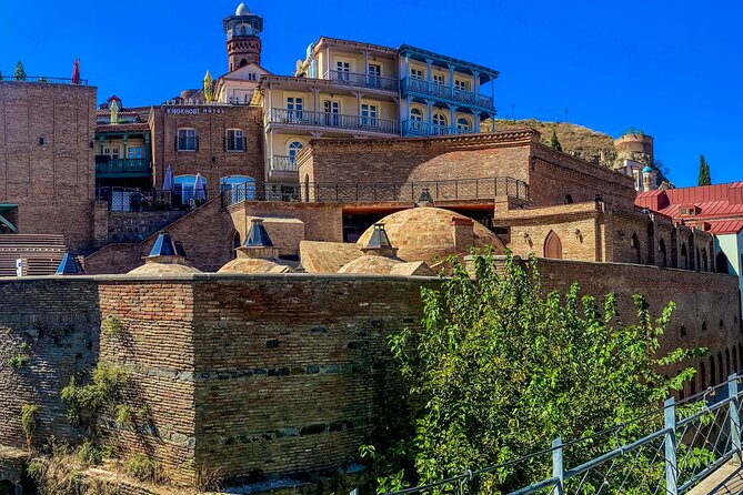 Tbilisi Walking Tour Including Cable Car and Traditional Bakery - The clock tower and the character of Old Tbilisi