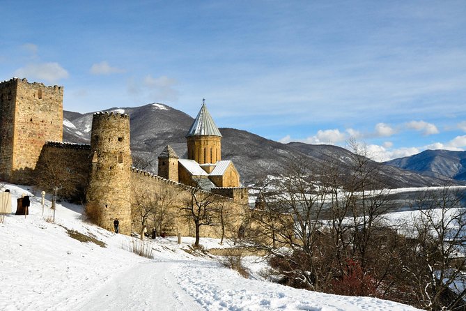 Tour to Kazbegi Ananuri Zhinvali Gudauri Full Day - Ananuri Fortress, carved stone, and the Aragvi